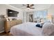 Large main bedroom with a walk-in closet and water views at 9525 Blind Pass Rd # 507, St Pete Beach, FL 33706