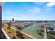 Breathtaking waterfront view of marina and city skyline at 9525 Blind Pass Rd # 507, St Pete Beach, FL 33706