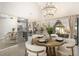 Elegant dining room with a wood table and access to the kitchen and patio at 9649 Wilsky Blvd # 3, Tampa, FL 33615