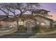 Inviting exterior featuring a two-story home with a charming walkway and landscaping at 9649 Wilsky Blvd # 3, Tampa, FL 33615