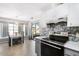 Modern kitchen with stainless steel appliances and breakfast nook at 9649 Wilsky Blvd # 3, Tampa, FL 33615