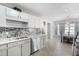 Modern kitchen with gray cabinets, quartz countertops, and stainless steel appliances at 9649 Wilsky Blvd # 3, Tampa, FL 33615