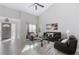 Bright living room featuring a comfy seating area and large windows at 9649 Wilsky Blvd # 3, Tampa, FL 33615