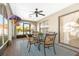 Relaxing screened patio with seating and view of the pool at 9649 Wilsky Blvd # 3, Tampa, FL 33615