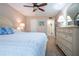 Spacious bedroom with king-size bed and ample storage at 1005 Rickenbacker Dr, Sun City Center, FL 33573