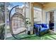 Inviting screened porch features comfortable seating and peaceful outdoor views at 10601 Shady Falls Ct, Riverview, FL 33578