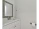 Modern powder room with white vanity and quartz countertop at 10883 Dragonwood Dr, Tampa, FL 33647