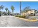 Community entrance with gated access and landscaping at 10883 Dragonwood Dr, Tampa, FL 33647