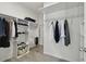 Large walk-in closet with shelving and hanging rods at 10883 Dragonwood Dr, Tampa, FL 33647