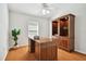 Spacious home office with built-in shelving and desk at 11411 Turtle Dove Pl, New Port Richey, FL 34654