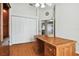 Home office with built-in wooden desk and storage at 11411 Turtle Dove Pl, New Port Richey, FL 34654