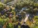 Aerial view of neighborhood with several homes at 12332 Harris Hawk Rd, Weeki Wachee, FL 34614