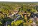 Aerial view of house and surrounding neighborhood at 12332 Harris Hawk Rd, Weeki Wachee, FL 34614