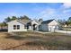 Newly constructed home with attached garage and fenced yard at 12332 Harris Hawk Rd, Weeki Wachee, FL 34614