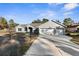 Newly built home with three-car garage and fence at 12332 Harris Hawk Rd, Weeki Wachee, FL 34614