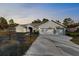 Newly built home with three-car garage and fence at 12332 Harris Hawk Rd, Weeki Wachee, FL 34614