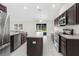 Bright kitchen with stainless steel appliances and island at 12332 Harris Hawk Rd, Weeki Wachee, FL 34614