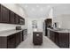 Spacious kitchen with stainless steel appliances and an island at 12332 Harris Hawk Rd, Weeki Wachee, FL 34614