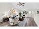 Living room with hardwood floors, vaulted ceiling and ceiling fan at 12332 Harris Hawk Rd, Weeki Wachee, FL 34614