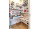 Well-organized pantry with wire shelving, ample storage at 12795 Fisherville Way, Riverview, FL 33579