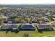 Aerial view of a community with single-Gathering homes and lush green areas at 1312 Leland Dr # 61, Sun City Center, FL 33573