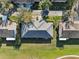 Aerial view of homes situated near a green golf course at 1312 Leland Dr # 61, Sun City Center, FL 33573