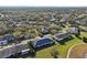 Aerial view showcasing a neighborhood's layout, homes, and landscaping at 1312 Leland Dr # 61, Sun City Center, FL 33573