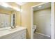 Clean bathroom with single sink vanity and toilet at 1312 Leland Dr # 61, Sun City Center, FL 33573