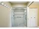 Shower stall with glass doors and grab bars at 1312 Leland Dr # 61, Sun City Center, FL 33573