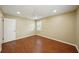 Bright bedroom with wood floors and window shutters at 1312 Leland Dr # 61, Sun City Center, FL 33573