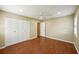Large bedroom with wood floors, ceiling fan and closet at 1312 Leland Dr # 61, Sun City Center, FL 33573