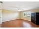 Bright bedroom with hardwood floors and ceiling fan at 1312 Leland Dr # 61, Sun City Center, FL 33573