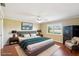 Spacious main bedroom with hardwood floors and stylish decor at 1312 Leland Dr # 61, Sun City Center, FL 33573