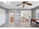 Open dining area with hardwood floors and view to kitchen at 1312 Leland Dr # 61, Sun City Center, FL 33573