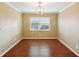 Bright dining room with wood floors and window at 1312 Leland Dr # 61, Sun City Center, FL 33573