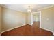 Bright dining room with wood floors and light walls at 1312 Leland Dr # 61, Sun City Center, FL 33573