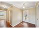 Light and airy entryway with hardwood floors at 1312 Leland Dr # 61, Sun City Center, FL 33573