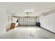 Attached garage with storage cabinets and opener at 1312 Leland Dr # 61, Sun City Center, FL 33573