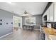 Eat-in kitchen with granite countertops and white cabinets at 1312 Leland Dr # 61, Sun City Center, FL 33573