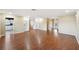 Bright living room with hardwood floors and built-in shelving at 1312 Leland Dr # 61, Sun City Center, FL 33573