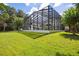 Screened pool area and lush lawn at 15612 Cochester Rd, Tampa, FL 33647