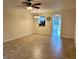 Bright dining room with tile floors and view into kitchen at 15848 Fishhawk Falls Dr, Lithia, FL 33547