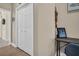 Hallway with double doors and wood floors at 1879 Nuthatch Way, Palm Harbor, FL 34683