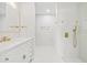 Elegant bathroom with marble shower and gold accents at 2024 N Pebble Beach Blvd, Sun City Center, FL 33573