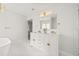 Bathroom with double vanity and gold accents at 2024 N Pebble Beach Blvd, Sun City Center, FL 33573