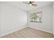 Well-lit bedroom with a window and ceiling fan at 2024 N Pebble Beach Blvd, Sun City Center, FL 33573