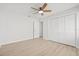 Spacious bedroom with ample closet space and ceiling fan at 2024 N Pebble Beach Blvd, Sun City Center, FL 33573