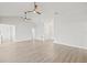 Large living area with hardwood floors, high ceilings, and sliding glass doors at 2024 N Pebble Beach Blvd, Sun City Center, FL 33573