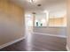 Bright hallway with tile flooring and neutral walls at 2246 Fiesta Dr, Sarasota, FL 34231