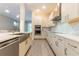 Spacious kitchen with stainless steel appliances and island at 2246 Fiesta Dr, Sarasota, FL 34231